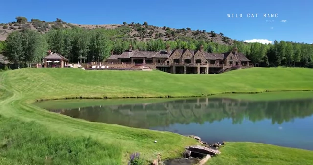 An aerial shot of "Wild Cat Ranch" in Colorado, a luxurious estate belonging to David Bonderman, where crucial meetings took place.).