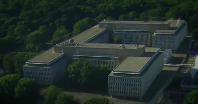 An aerial view of the Central Intelligence Agency (CIA) Headquarters building, providing a visual representation of the intelligence agency.).