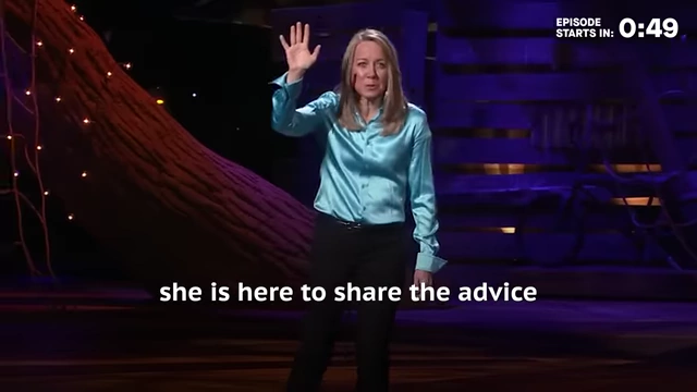 Dr. Meg Jay on stage during her TED Talk