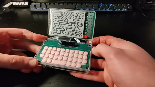 The completed e-ink PDA with its screen open and keyboard visible