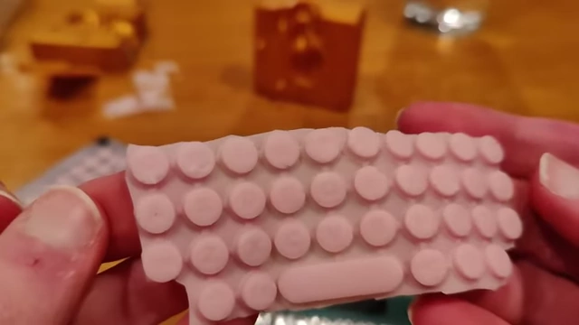 The successfully cast pink silicone keyboard membrane