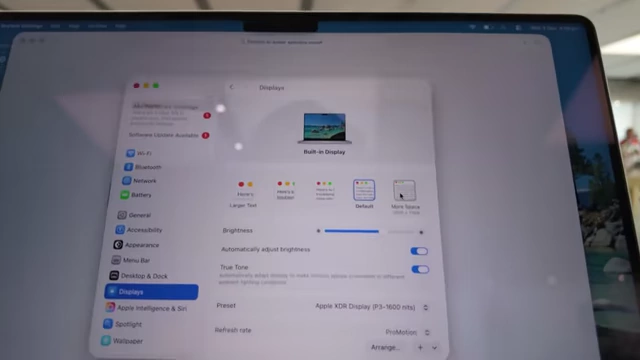 Display settings showing the 'More Space' option for maximizing screen real estate on the 14-inch MacBook Pro