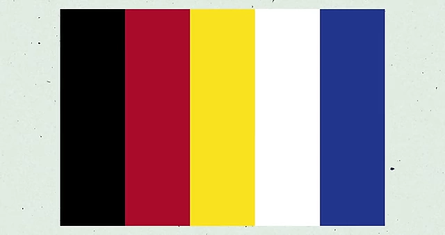 The Bauhaus primary color palette (black, red, yellow, white, blue) used in set design
