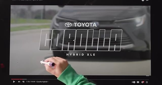 Animated text revealing the Toyota Corolla Hybrid XLE chapter marker