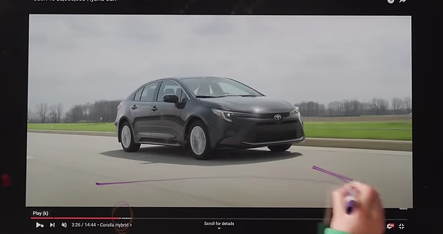 The visual transition of a car driving out of frame to signify a scene ending
