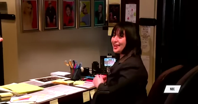 Harper at her desk at SNL, illustrating her early career in traditional media