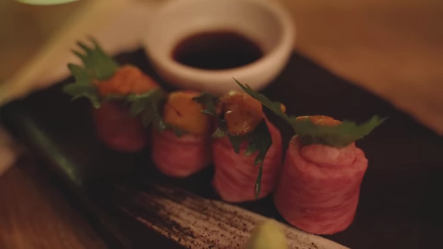 A beautifully presented plate of Kobe beef sushi served at Steak & Wine Hiro