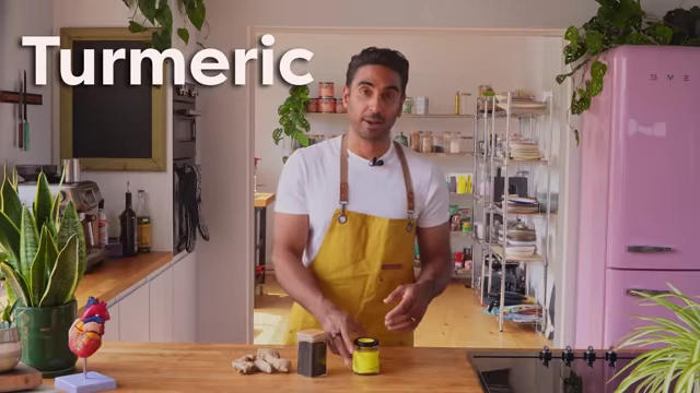 Ground turmeric is shown, known for its curcumin content.