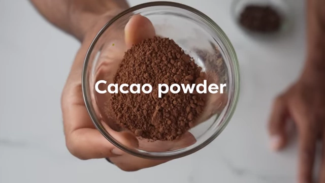 Cacao powder is displayed in a small bowl.