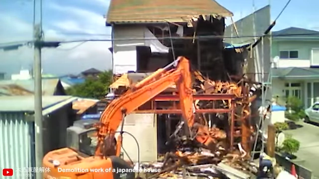 Demolition of a Japanese house, illustrating the "scrap-and-build" culture