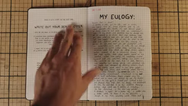 A journal opened to a page titled 'MY EULOGY', with prompts on the left page.