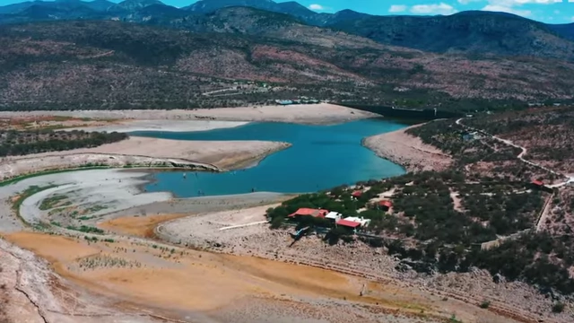 A dried-up riverbed, illustrating environmental poisoning