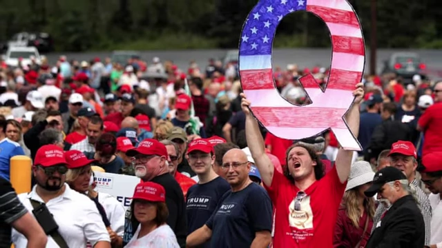 A QAnon rally, illustrating conspiratorial thinking