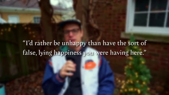 The speaker with a quote from 'Brave New World' about preferring unhappiness over 'false, lying happiness'