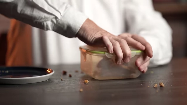 Cookies sealed in a clear plastic container, representing money being locked away to grow