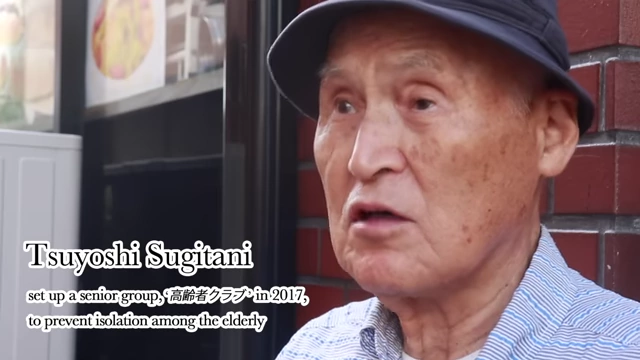 Tsuyoshi Sugitani, an elderly Japanese man, states that he set up a senior group to prevent isolation among the elderly, but many are reluctant to join.
