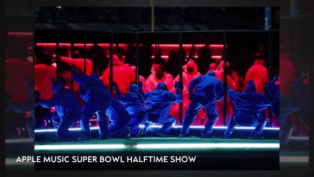 Kendrick Lamar performing in a cage during the Super Bowl LVI Halftime Show