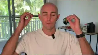 Man gesturing with both hands at his temples, emphasizing the mind's role in creating stories.