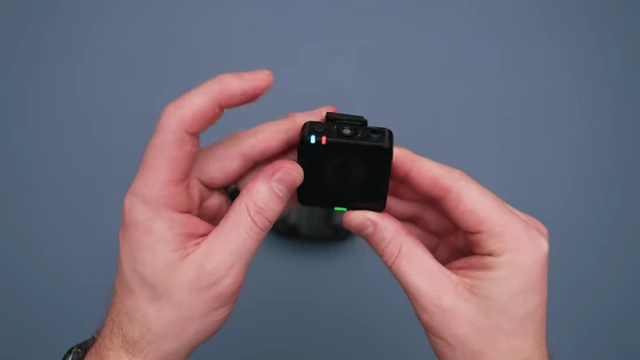 The Rode Wireless Pro transmitter being held in hand.