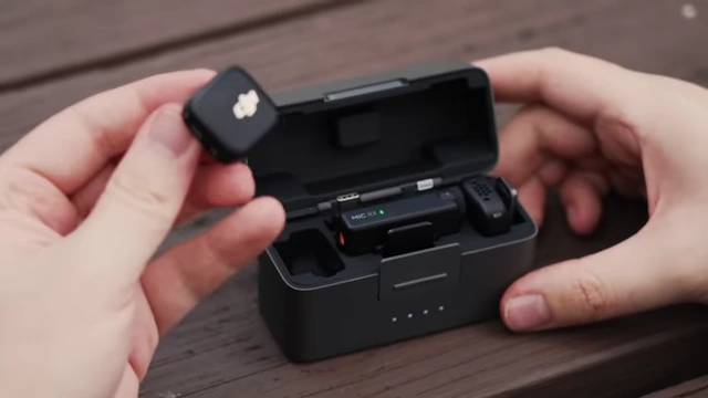 The DJI Mic Mini charging case with all components neatly stored inside.