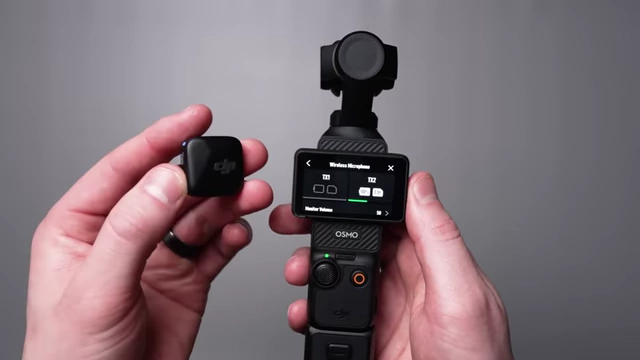 DJI Mic Mini transmitter wirelessly connected to a DJI Osmo Pocket 3.