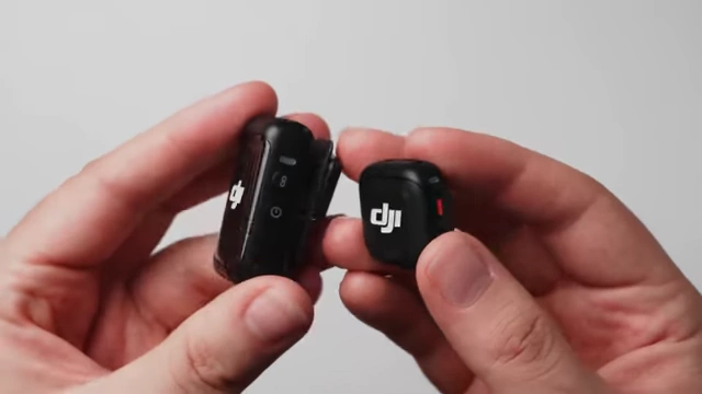 Comparison shot of the DJI Mic 2 and DJI Mic 3 transmitters, highlighting the smaller size of the Mic 3.