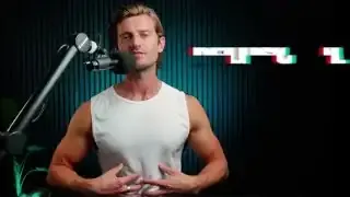 The speaker demonstrating ab exercises, highlighting the misconception that more ab training directly leads to a leaner midsection.