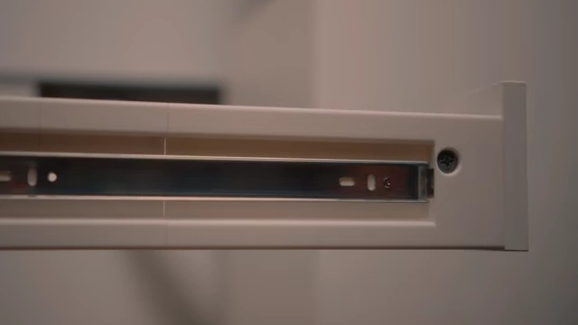 Detail view of the upgraded Alex drawer track, showing the full extension