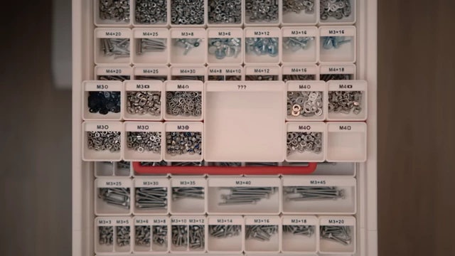 Second layer of Gridfinity bins in an Alex drawer, containing nuts and washers