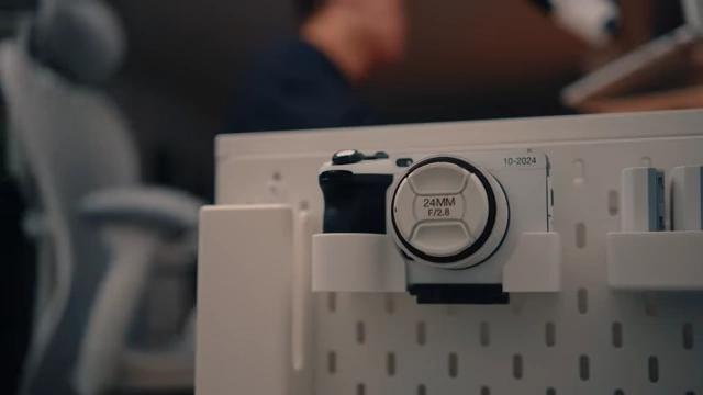 A camera securely mounted in a 3D printed holder on the SKADIS pegboard