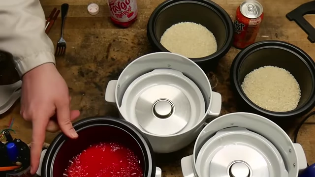 Rice soaking in bright red Faygo Red Pop.