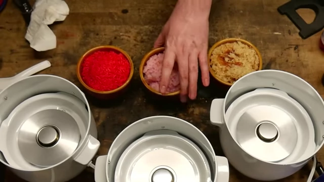 Overview of the three cooked rice dishes from Round 1: Faygo Red Pop (red), Gamer Supps (pink), and Yuengling beer (brown).