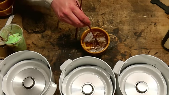 Cigarette water being stirred in a bowl.