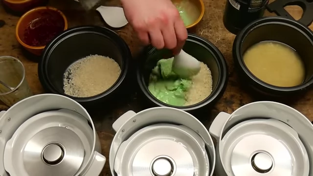Adding melted, green Shamrock Shake to rice in a cooker.