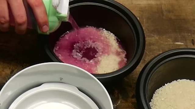 Pouring purple Gamer Supps liquid into rice.