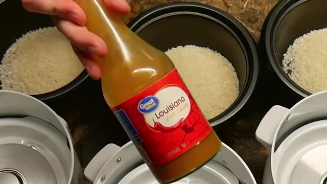 A bottle of Great Value Louisiana hot sauce.