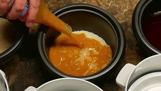 Pouring orange Walmart hot sauce into rice.