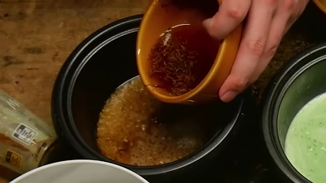 Pouring cigarette water, including tobacco remnants, into rice.