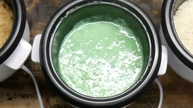 Shamrock Shake rice bubbling during cooking, showing its sludgy consistency.