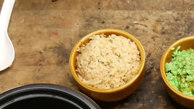 Close-up of the brown cooked cigarette water rice.