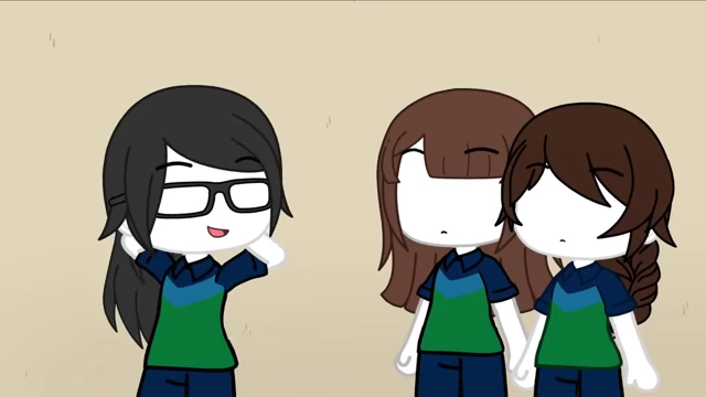 Claudia showing off the glasses to other friends, asking "Do I look good with glasses?".