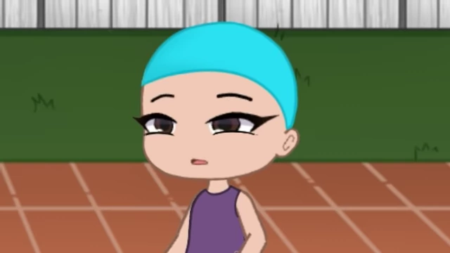 The speaker's confused expression as she tries to discern what people are doing without her glasses.