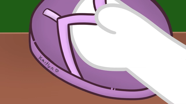 A flip-flop with "Kaitlyn ❤️" written on it, marking her personal item.
