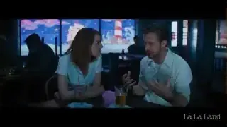 A medium shot of two characters in a diner, captured during a conversation.