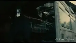A shot from Children of Men, demonstrating realist, handheld camera work during an intense scene.