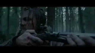 A shot from The Revenant, showing a character in a snowy forest, highlighting the film's blend of realism and artistic framing.