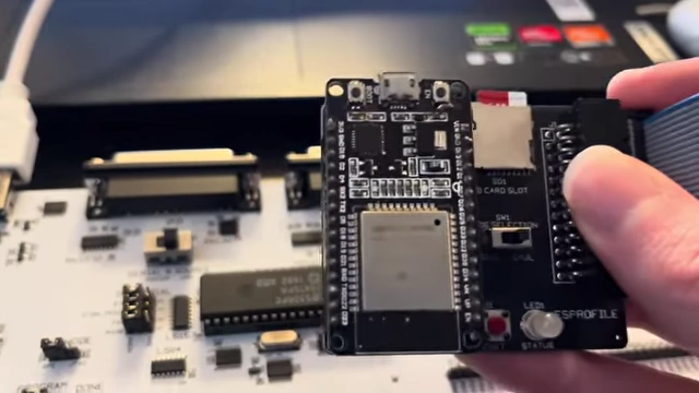 A comparison showing the older ES-profile board and the new integrated design on the LisaFPGA