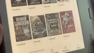 Kobo Libra Color's home screen displaying book covers in color and UI elements