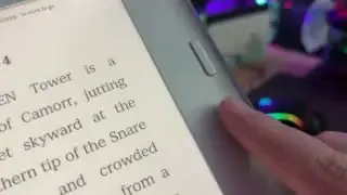 Close-up of the Kobo Libra Color's page-turn buttons on the side bezel