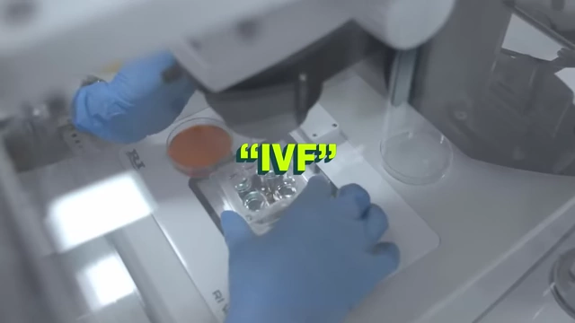 Text "IVF" displayed over a laboratory image showing a scientist working with a petri dish, illustrating the shared initial process with egg freezing